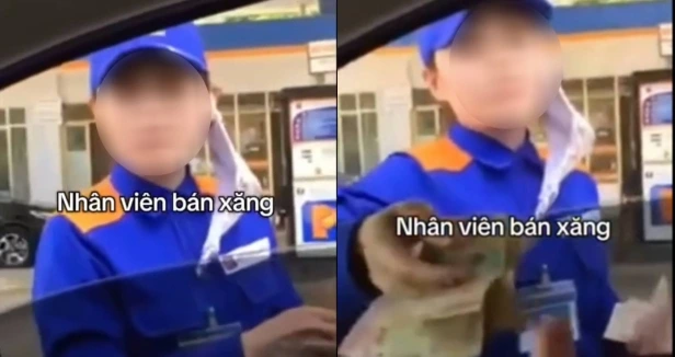 Ảnh nhân viên bán xăng trong clip xôn xao mạng xã hội gần đây (ảnh cắt từ clip)