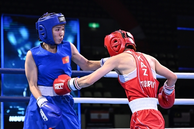Nguyen Thi Ngoc Tran of Vietnam (left) defeats Kazakhstan’s tough Gulnar Turapbay in the ASBC Asian U22 &amp; Youth Boxing Championships' women's U22 50kg class in Colombo, Sri Lanka, on May 23. (Photo of ASBC)