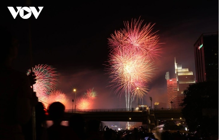 The high-altitude fireworks show at the entrance to the Saigon River tunnel opens the city’s grand celebration on April 30