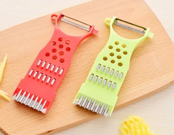Loạt lỗ tròn trên nạo rau củ - phần giữa thân dụng cụ - được dùng để bào, mài, nạo thực phẩm.