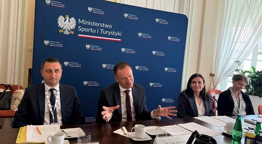  Polish Secretary of State for Sport and Tourism Piotr Borys (centre) speaks at the event