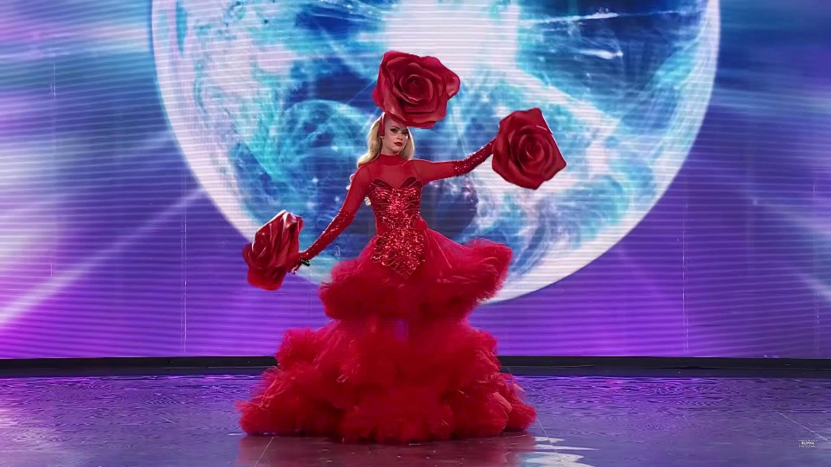 UK representative Brittany Feeney looks glamorous in an outfit inspired by the rose.