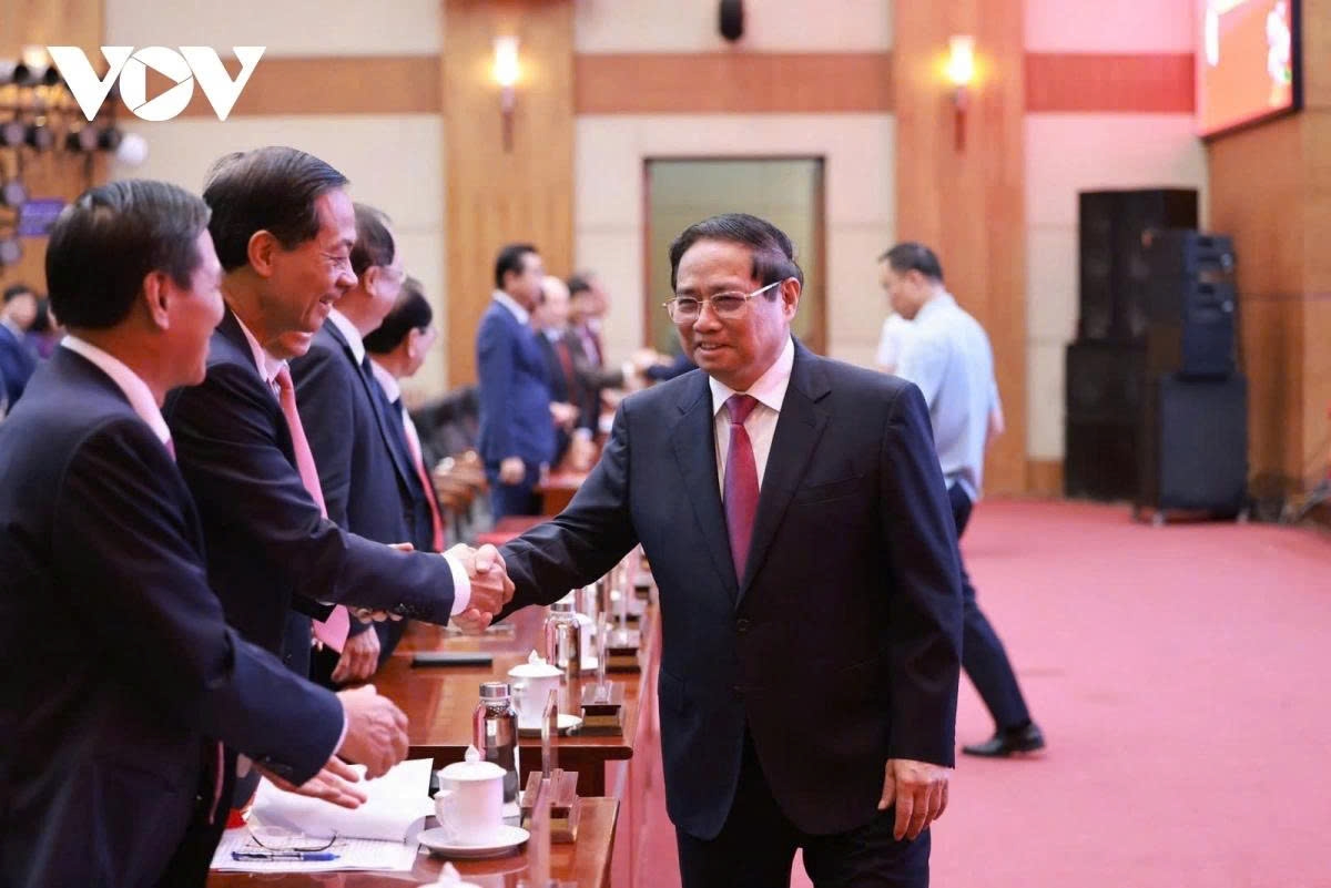Prime Minister Pham Minh Chinh attends the ceremony announcing the administrative merger of Hai Phong city and Hai Duong province that are both important localities in the Northern Key Economic Region.