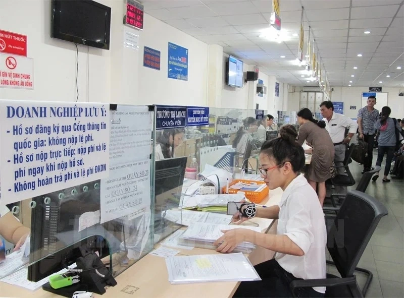 Doanh nghiệp không bắt buộc phải thay đổi thông tin trên giấy đăng ký kinh doanh mà có thể thực hiện theo nhu cầu sau khi sáp nhập tỉnh (Ảnh minh họa: KT)