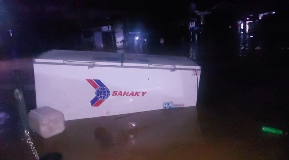As floodwaters surge, many residents could only watch helplessly as their properties and livestock are swept away, with locals being unable to move them to safety in time
