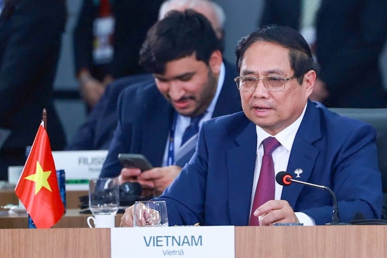 Thủ tướng Chính phủ Phạm Minh Chính phát biểu tại Phiên thảo luận cấp cao BRICS mở rộng. Ảnh: VGP