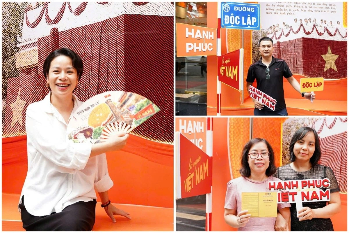 Đông đảo người dân tạo dáng cùng quà tặng SHB tại photobooth trên đường Trần Hưng Đạo, Hà Nội