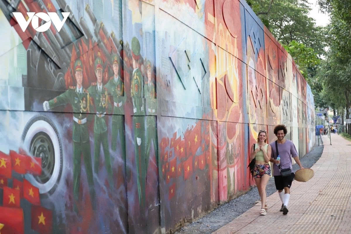 The street has attracted numerous locals and tourists who come to admire and enjoy the new artwork.