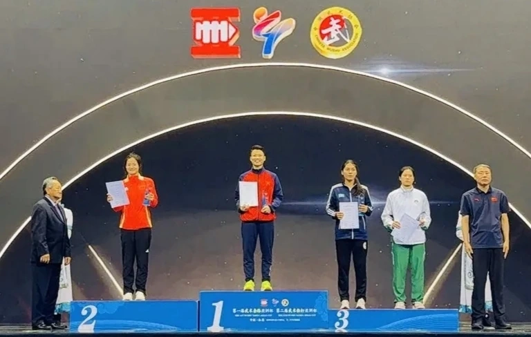 Thu Thuy wins one gold medal in the women’s sanda 56kg division at World Wushu Championships.
(Image source: tdtt.gov.vn)