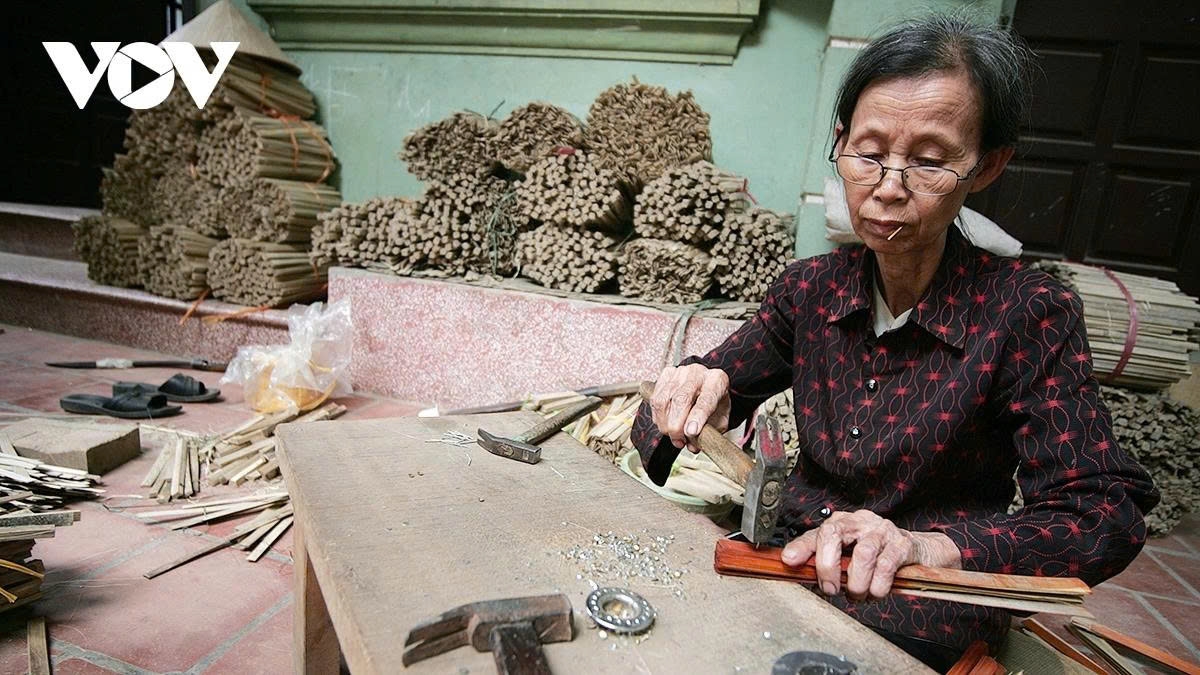 Most villagers learn fan-making from an early age. A local artisan shares that she has spent her whole life making fans.