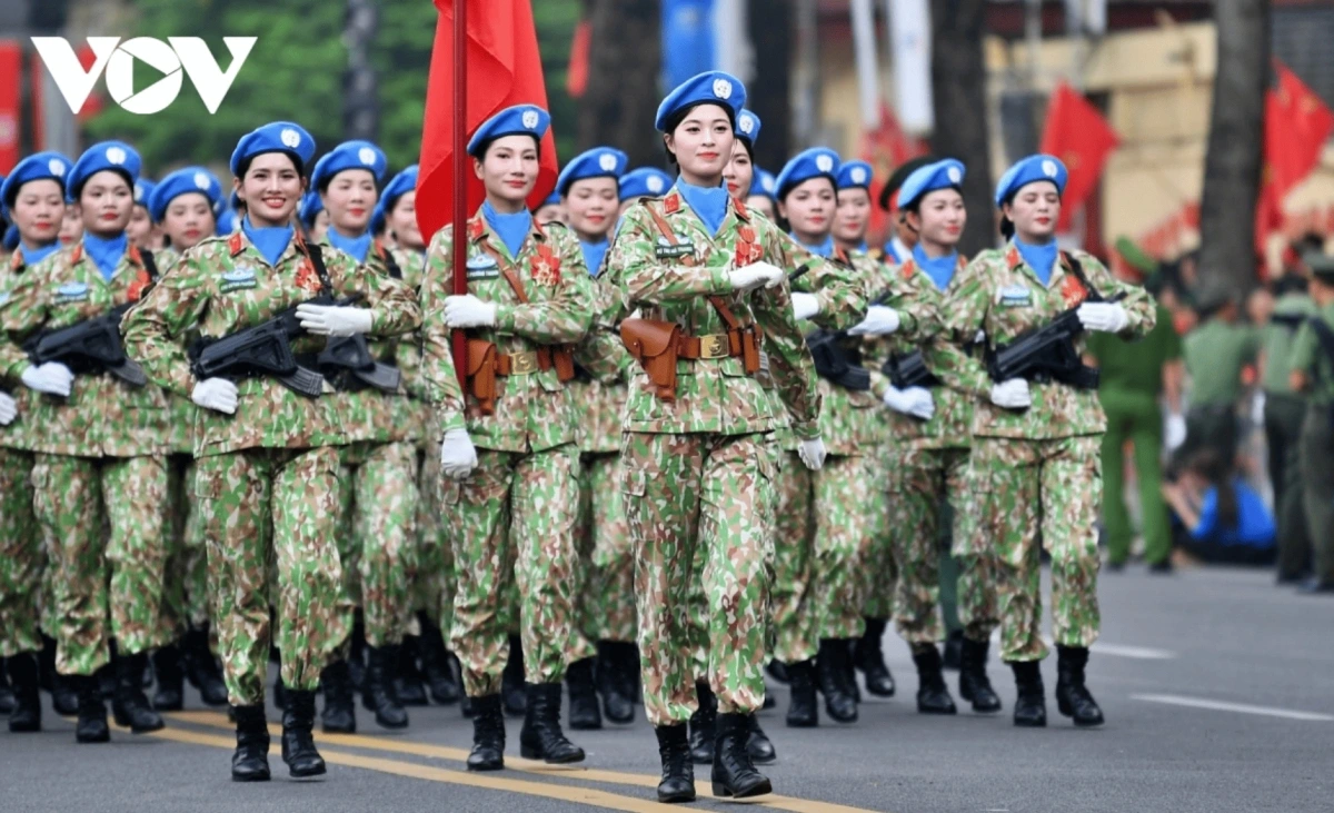   A formation of the female contingent of Vietnam’s Peacekeeping Forces march past the grand stand at Ba DInh Square.