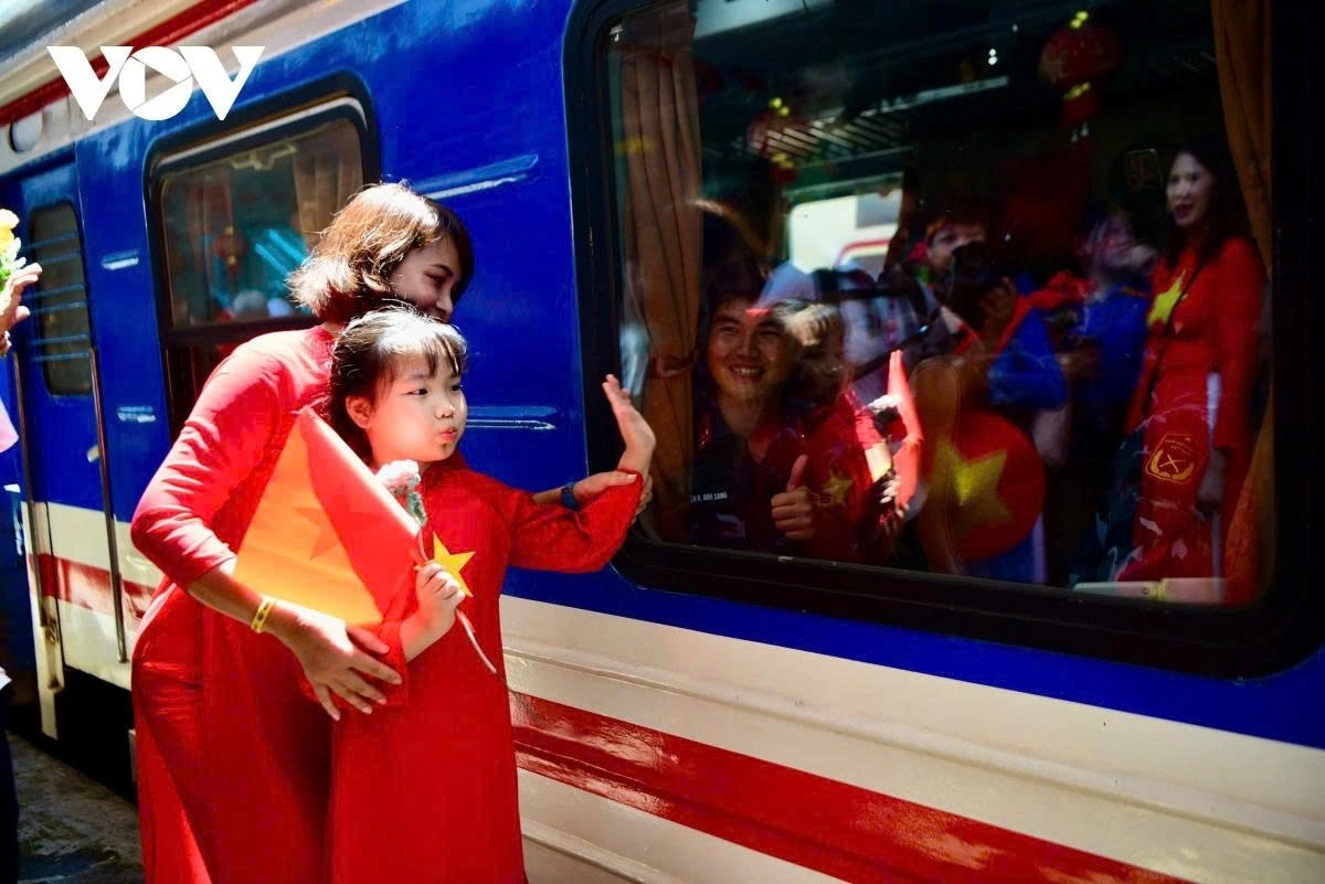 Children brought by parents bid farewell to soldiers