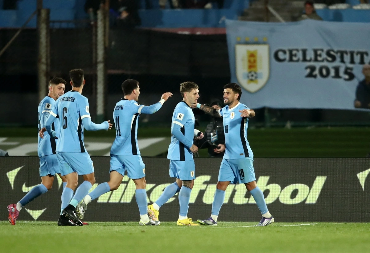 Các cầu thủ Uruguay ăn mừng tấm vé dự VCK World Cup 2026. (Ảnh: Reuters). 