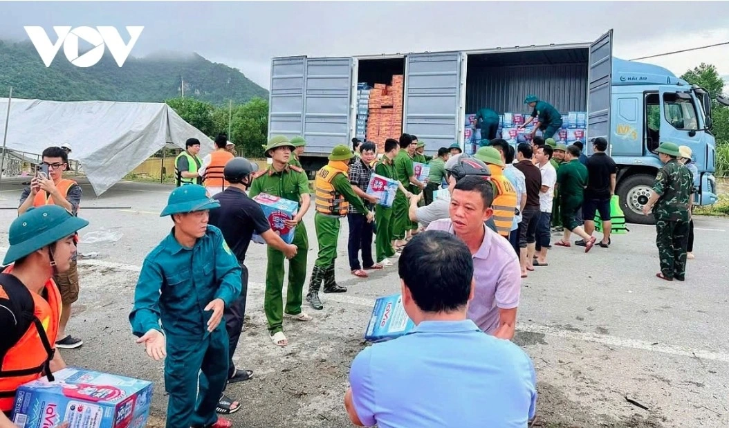 Essential supplies such as food, water and medicine are delivered to residents in flood-hit areas of Nghe An province
