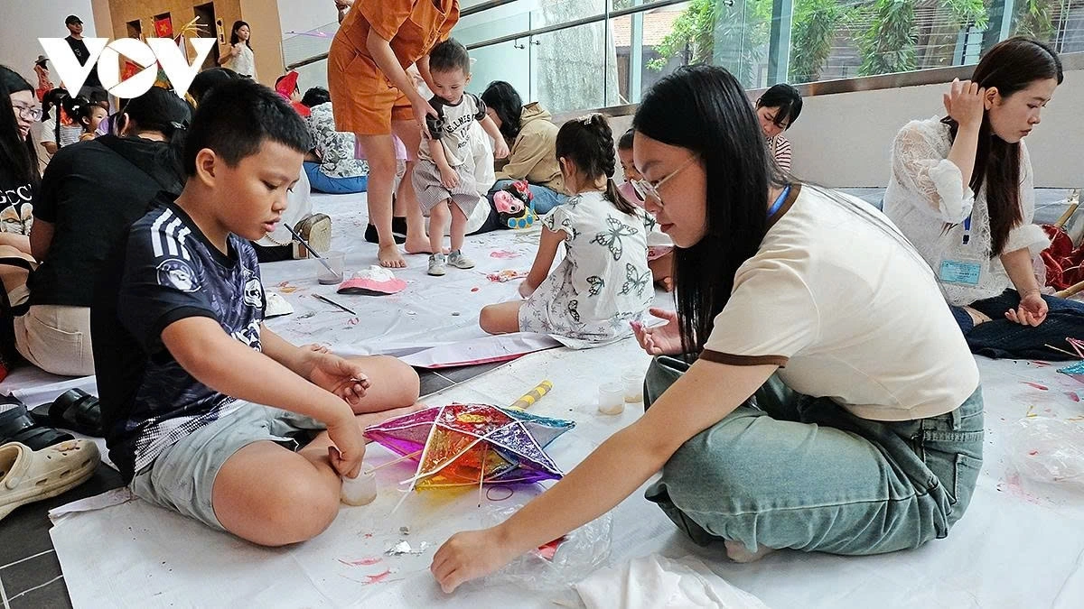 Children enjoy making star-shaped lanterns