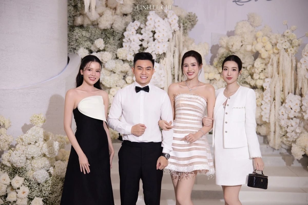 Hoa hậu Đỗ Mỹ Linh diện váy rộng thùng thình, đi giày bệt xuất hiện tại đám cưới của Đỗ Hà làm dấy lên tin đồn mang bầu lần 2.