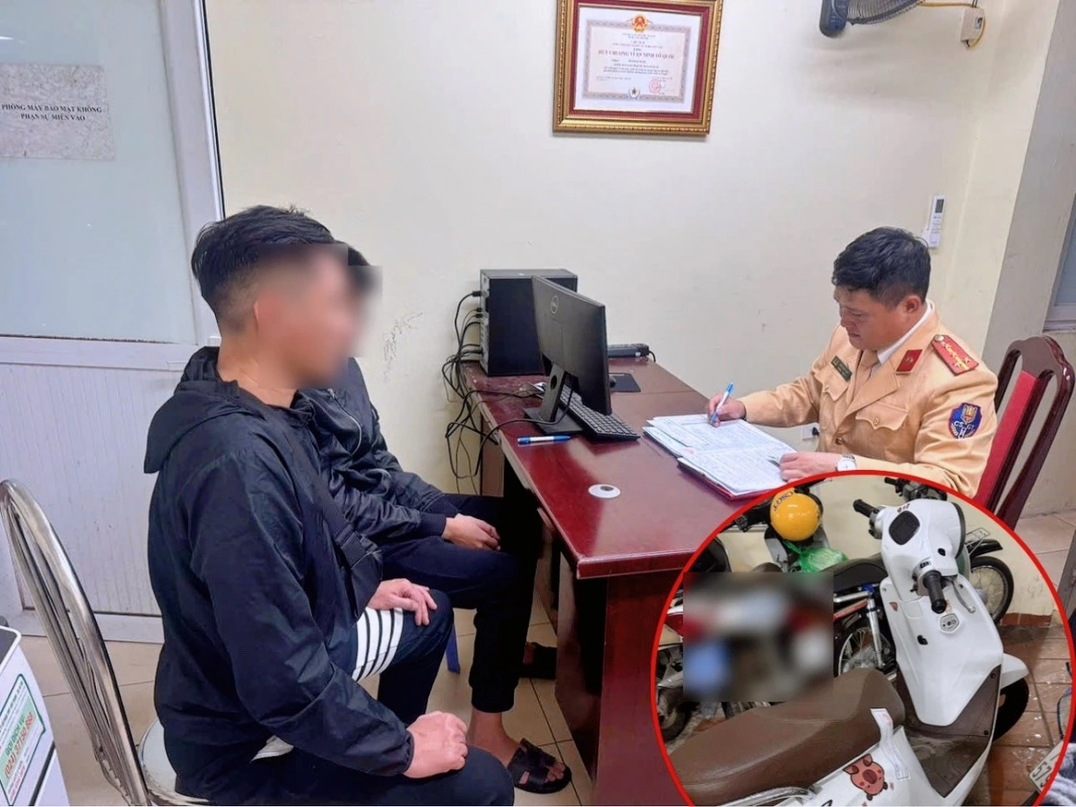 CSGT làm việc với nam thanh niên vi phạm cùng với sự chứng kiến của phụ huynh