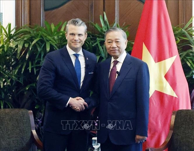 Tổng Bí thư, Chủ tịch nước Tô Lâm tiếp Bộ trưởng Bộ Chiến tranh Hoa Kỳ Pete Hegseth. Ảnh: Thống Nhất/TTXVN.