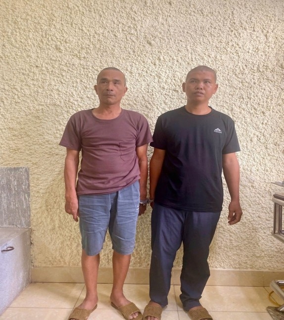 doi_tuong_ta_vuong_anh_tuan_ben_trai_va_doi_tuong_pham_xuan_hai_ben_phai_tai_co_quan_cong_an.jpeg