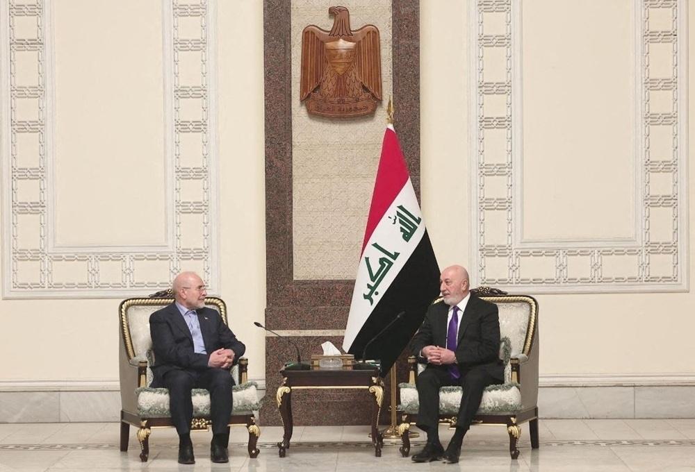 Tổng thống Iraq Nizar Amidi gặp Chủ tịch Quốc hội Iran (bên trái) tại Baghdad. Ảnh: Reuters