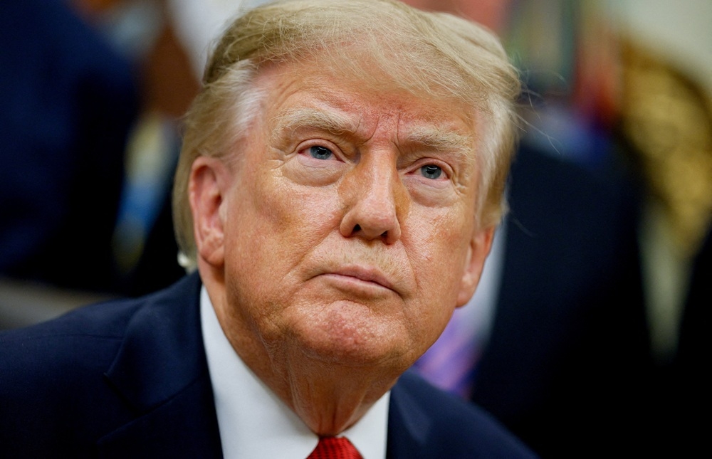 Ông Trump ký luật trừng phạt Nga liên quan xung đột Ukraine. Ảnh: Reuters