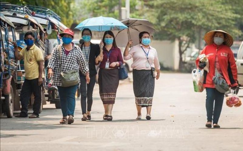 viet nam-lao thay doi quy dinh xuat nhap canh giua dich covid-19 hinh 1
