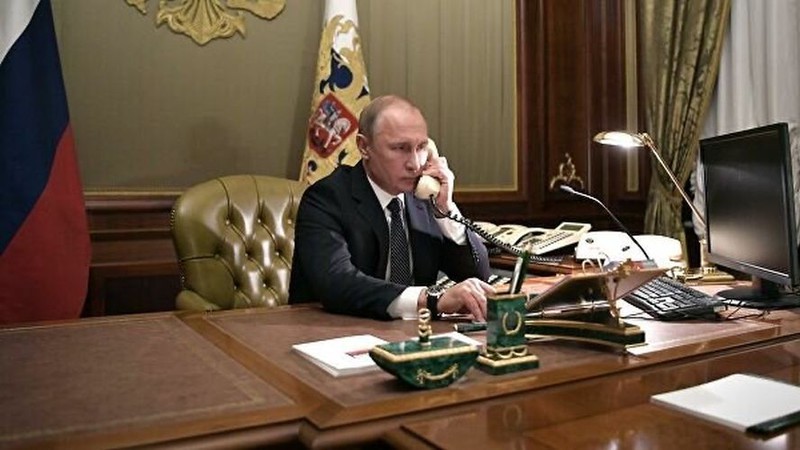 tong thong nga putin dien dam voi thu tuong duc merkel ve covid-19 hinh 1