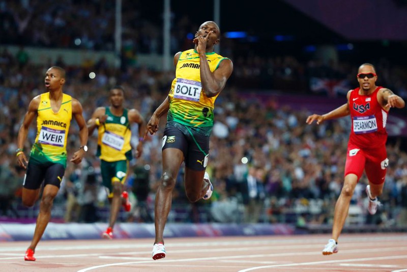ngay nay nam xua: usain bolt lap ky luc khong tuong o olympic  hinh 1