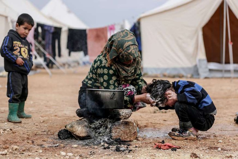 anh: giao tranh du doi o syria, tung doan dan thuong so tan khoi idlib hinh 13