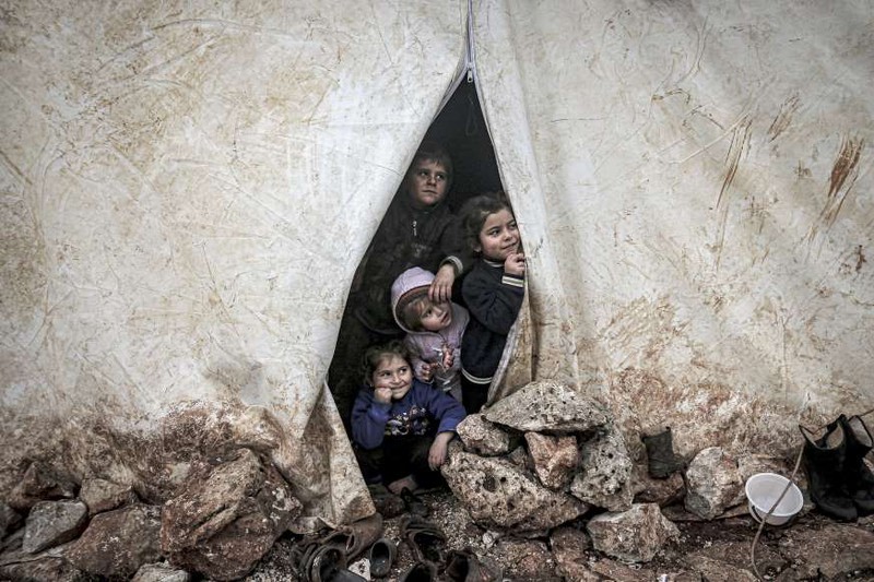 anh: giao tranh du doi o syria, tung doan dan thuong so tan khoi idlib hinh 17