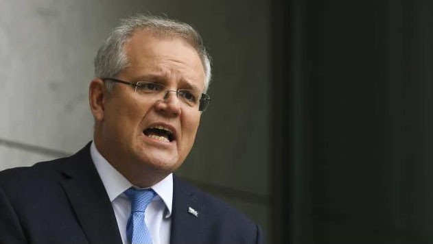 australia khuyen nguoi nuoc ngoai ve nuoc neu khong the tu lo duoc covid-19 hinh 1