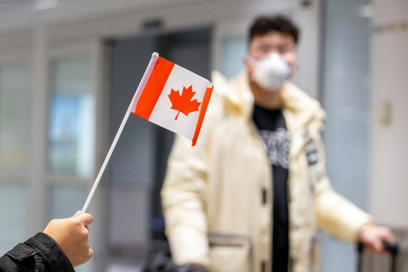 canada yeu cau toan bo hanh khach di may bay phai su dung khau trang  hinh 1
