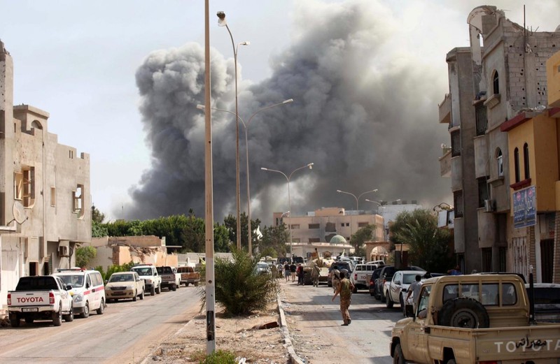 libya tro thanh "manh dat mau mo" cho cuoc chien uy nhiem dam mau? hinh 1