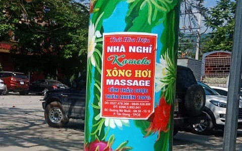 doanh nghiep bi phat 40 trieu dong vi dan quang cao tren cot dien hinh 1