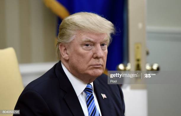 ong trump ky sac lenh cai to he thong canh sat my hinh 1