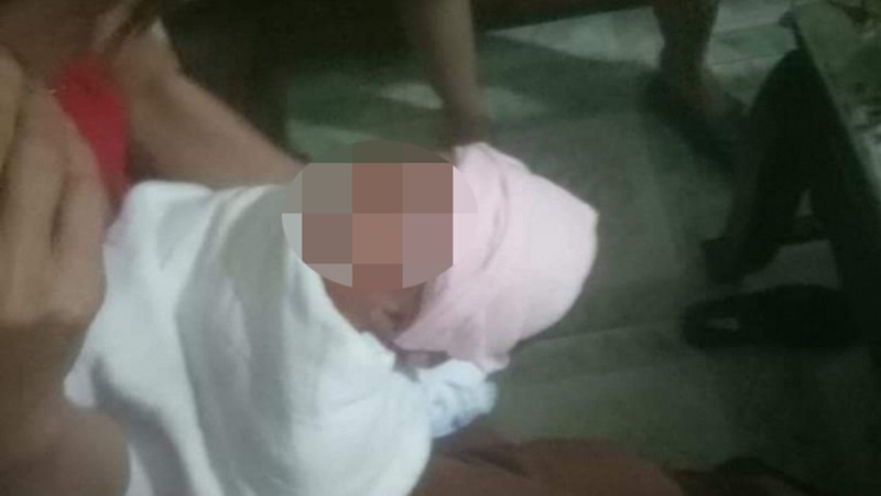 nghi van nguoi dan ong "ngao da" mang con 4 ngay tuoi di vut hinh 1