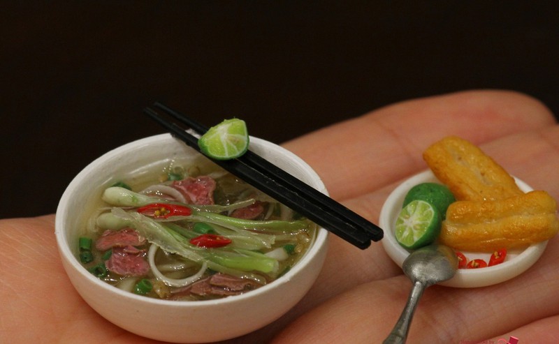 co gai lam dac san viet ti hon bang dat set hinh 1