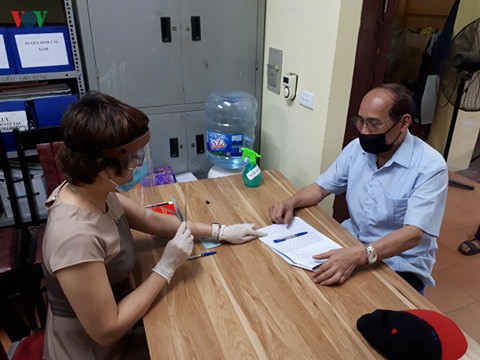 ha noi: nhieu quan da hoan thanh ho tro doi tuong chinh sach theo goi 62.000 ty hinh 1