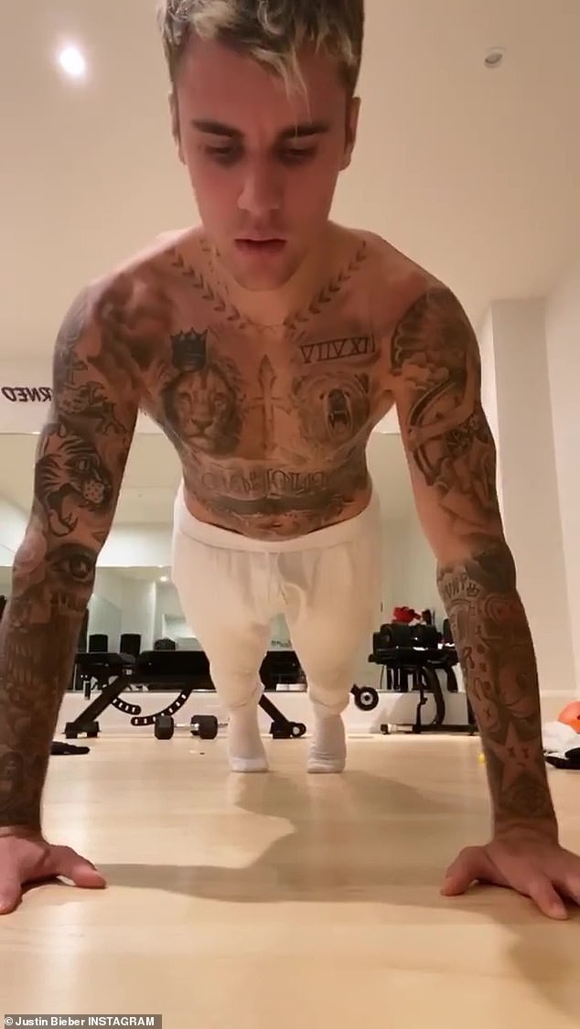 justin bieber coi ao, thuc hien thu thach chong day giua dot dich hinh 1