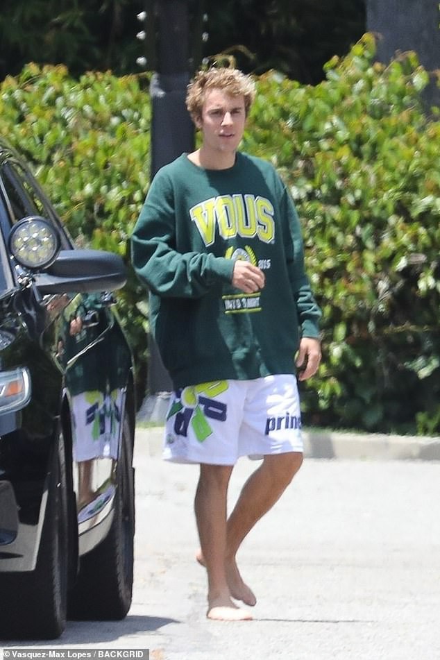 justin bieber tai xuat dien trai, di chan tran tren nen dat khi ra pho hinh 1