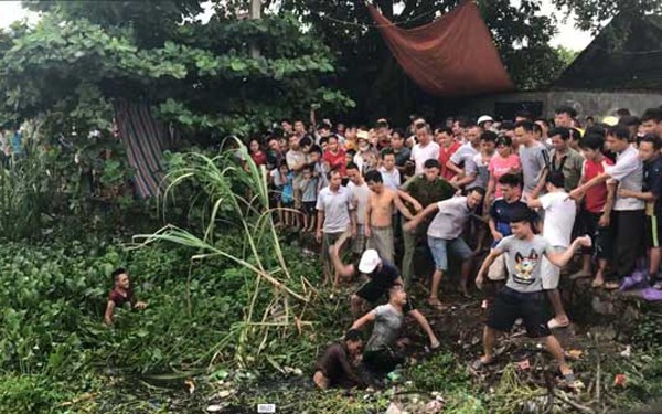dan lang ho nhau vay danh 2 ke nghi trom cho duoi muong nuoc den hinh 9