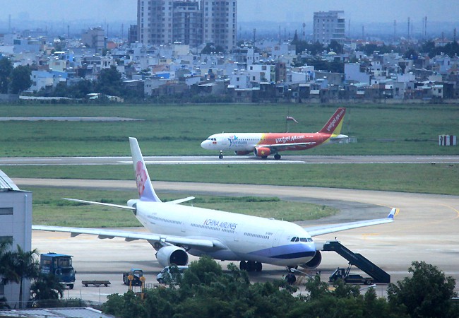 dung khai thac mot duong bang san bay tan son nhat vi lun, nut hinh 1
