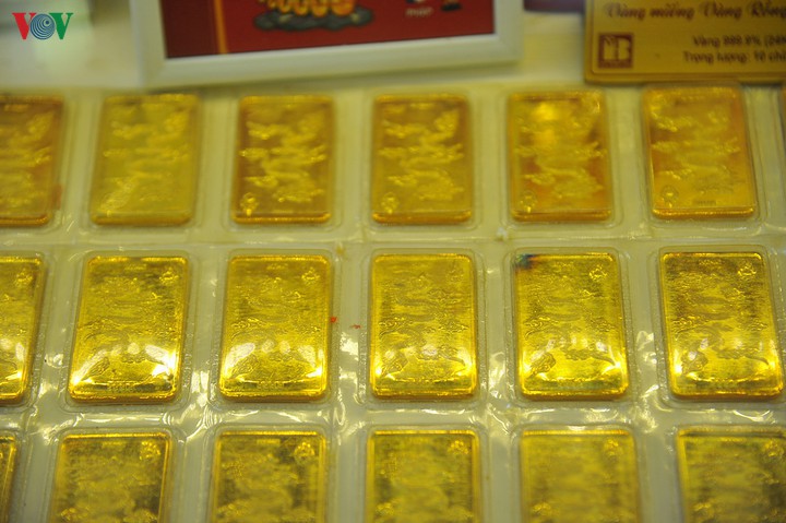 gia vang trong nuoc tien sat moc 57 trieu dong/luong hinh 1