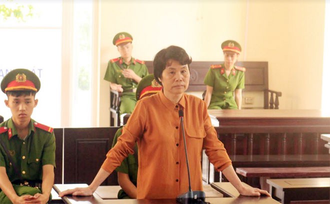 nguoi dan ba lua dao chay truong cong an, quan doi linh 14 nam tu hinh 1