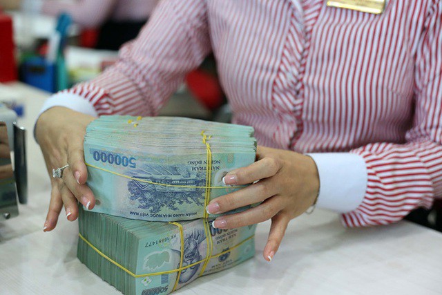 giam 50% le phi cap giay phep thanh lap ngan hang  hinh 1