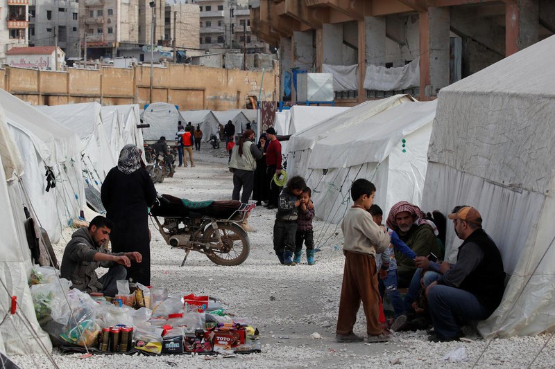 cang thang o idlib, tho nhi ky doa mo cua cho nguoi ti nan syria den chau au hinh 1