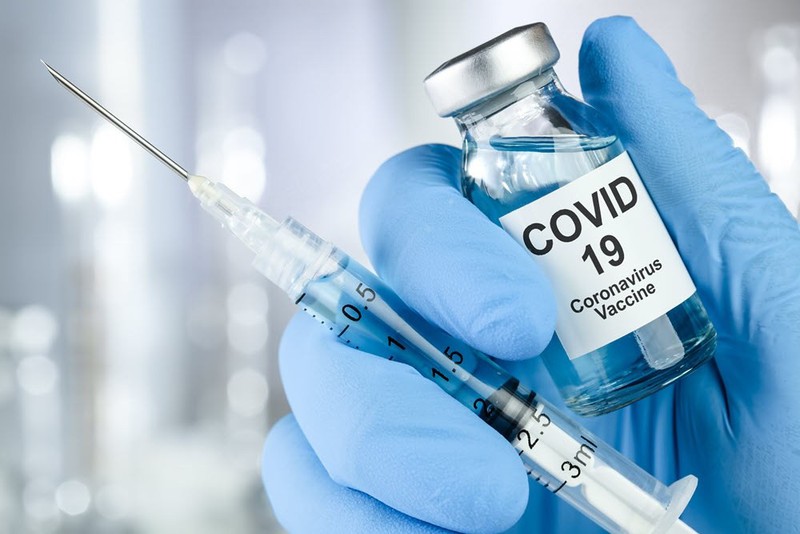 vaccine covid-19 - cuoc chien khoc liet mang danh "chu nghia dan toc" hinh 1