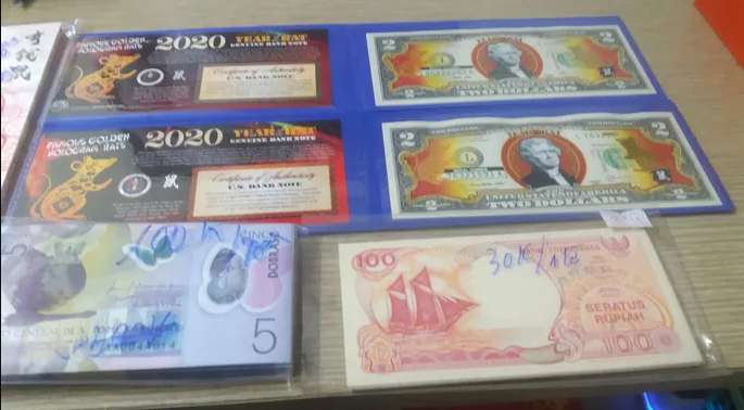 can than khi mua tien li xi 2 usd in hinh chuot ma vang hinh 1