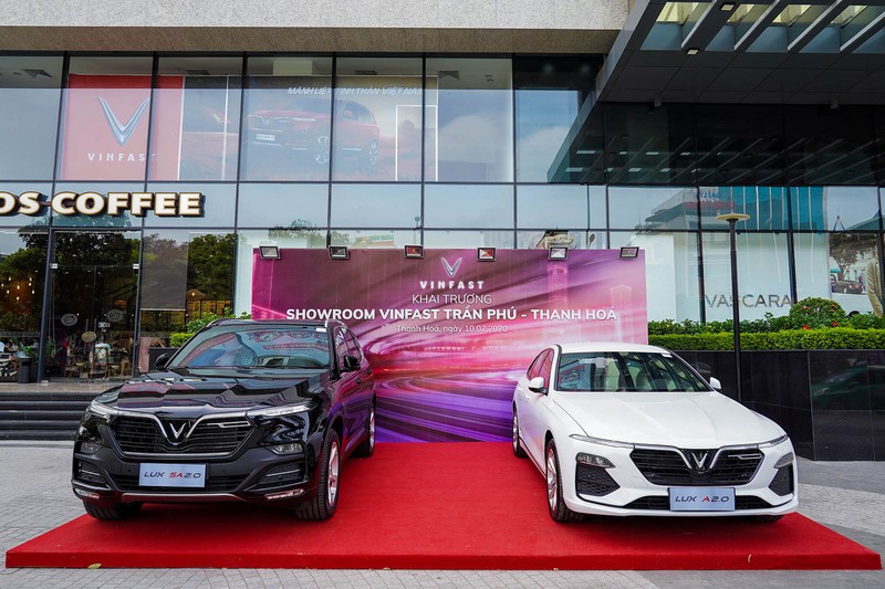 vinfast lap ky luc khai truong 27 showroom trong mot ngay hinh 2