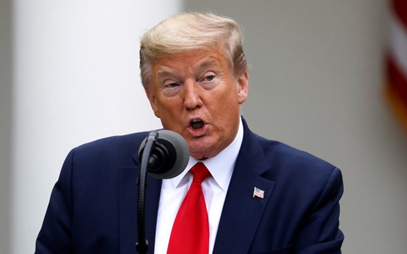 ong trump bac bo nguy co covid-19 lay lan trong nha trang hinh 1